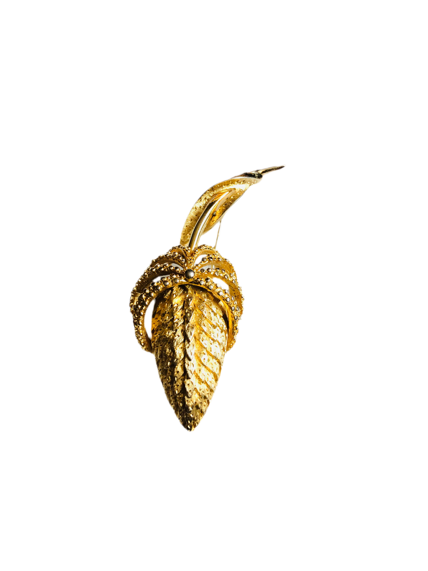 Broche vintage en forme de feuille dorée signée Coro