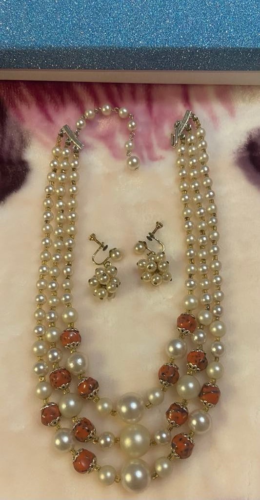 # 7 Vintage Three-Strand Pearl Necklace Set – Ivory & Coral Accents