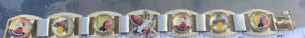 Bracelet souvenir « Jasper » — panneaux dorés, cabochons peints et feuille d'érable émaillée